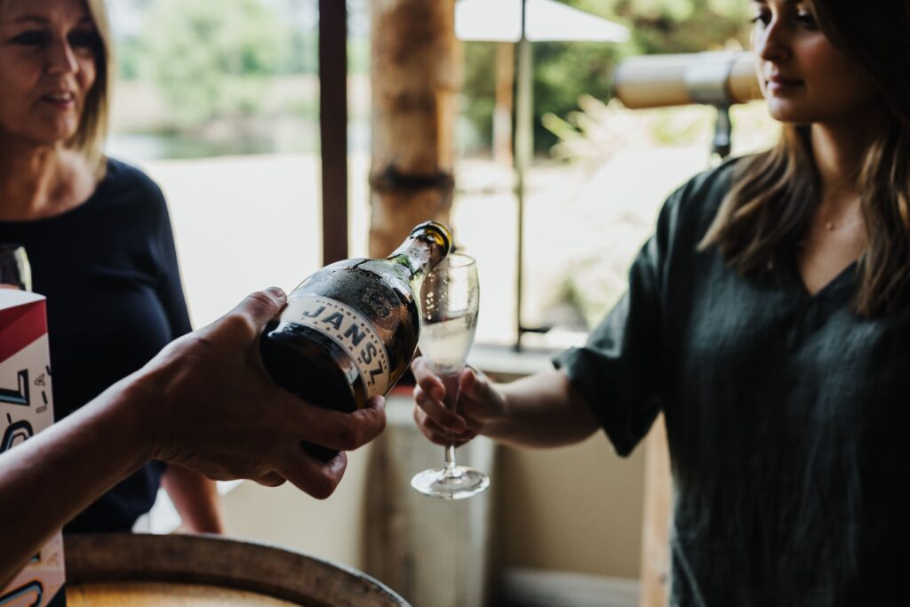Jansz Tasmanian sparkling wine being poured into a glass.