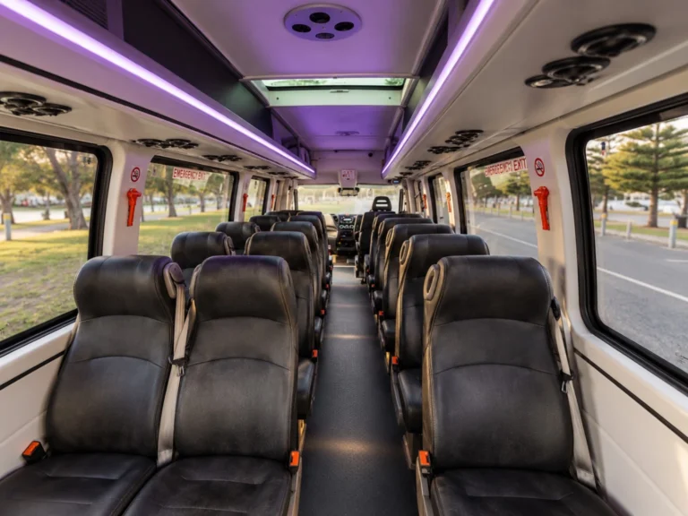 Individual passenger seats and overhead lighting inside LGST’s Iveco touring vehicle